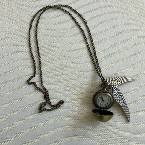 Harry Potter Golden Snitch functional time piece.